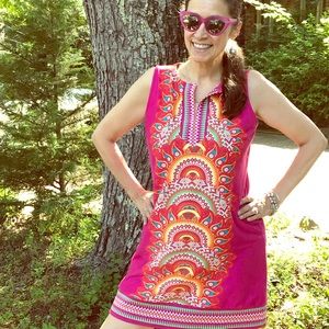 Bright colored dress. Great with a cardigan.